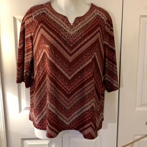 Catherine’s pull over top. In excellent condition.